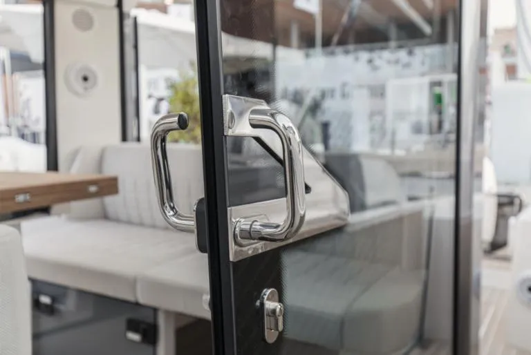 Slide: The Image of 2025 Saxdor 340 GTWA boat with white cushioned seating and cup holders. - 21