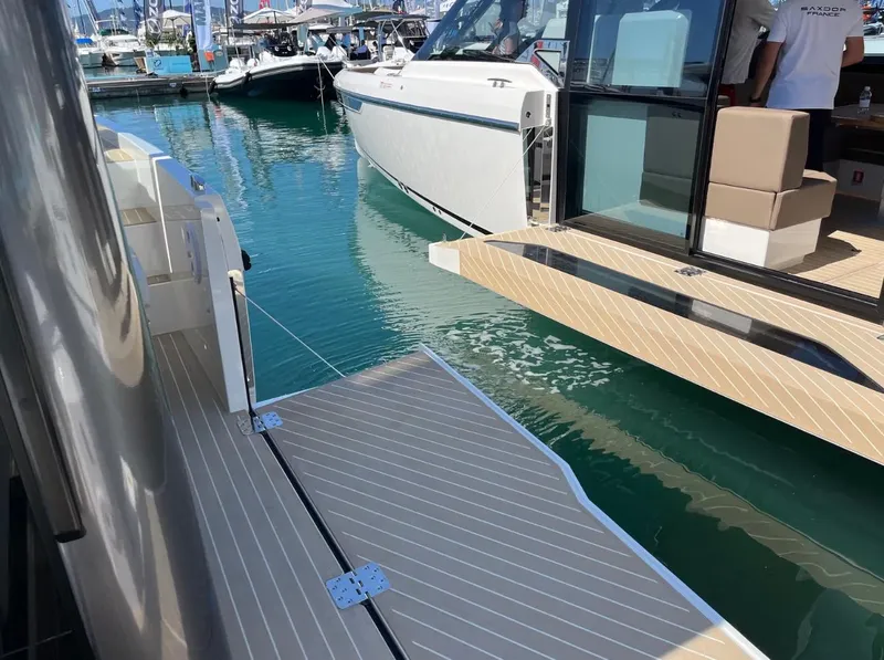 Slide: The Image of 2025 Saxdor 340 GTWA boat with sleek design and advanced navigation equipment. - 22