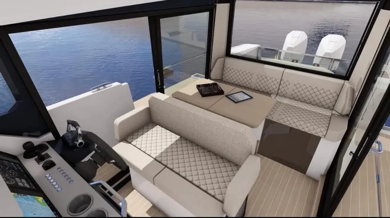 Slide: The Image of Control panel of 2025 Saxdor 340 GTWA boat with navigation screens and controls. - 33