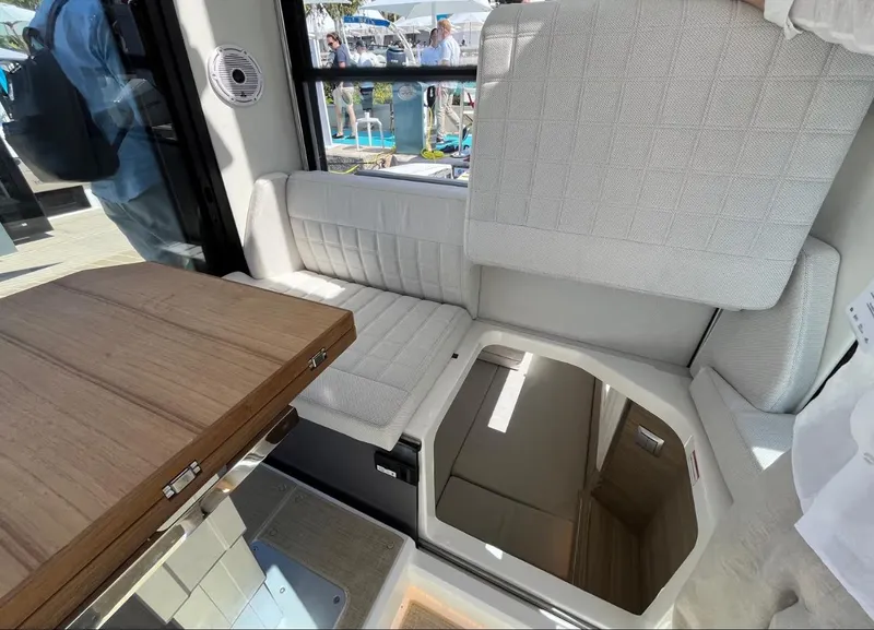 Slide: The Image of Interior of 2025 Saxdor 340 GTWA boat with modern helm and ocean view. - 34