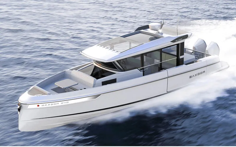 Slide: The Image of 2025 Saxdor 340 GTWA boat cruising on open water, showcasing sleek design and modern features. - 44