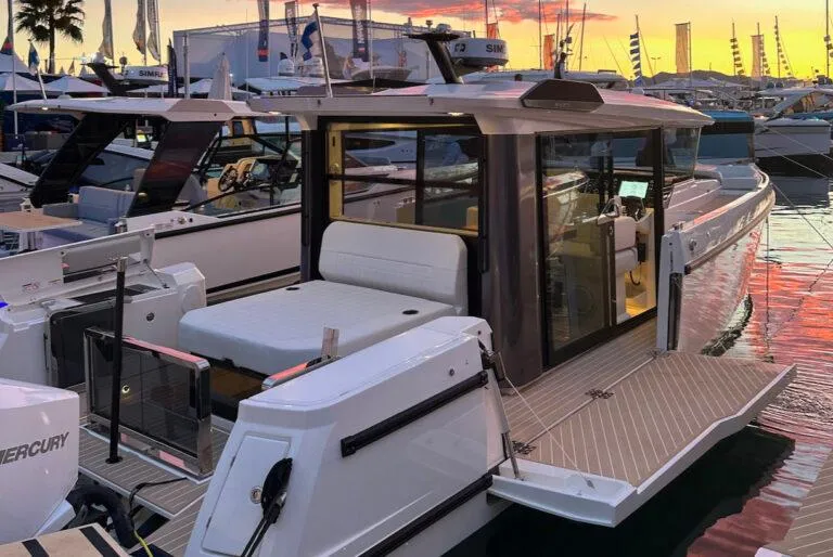 Slide: The Image of 2025 Saxdor 340 GTWA boat cruising on open water. - 8