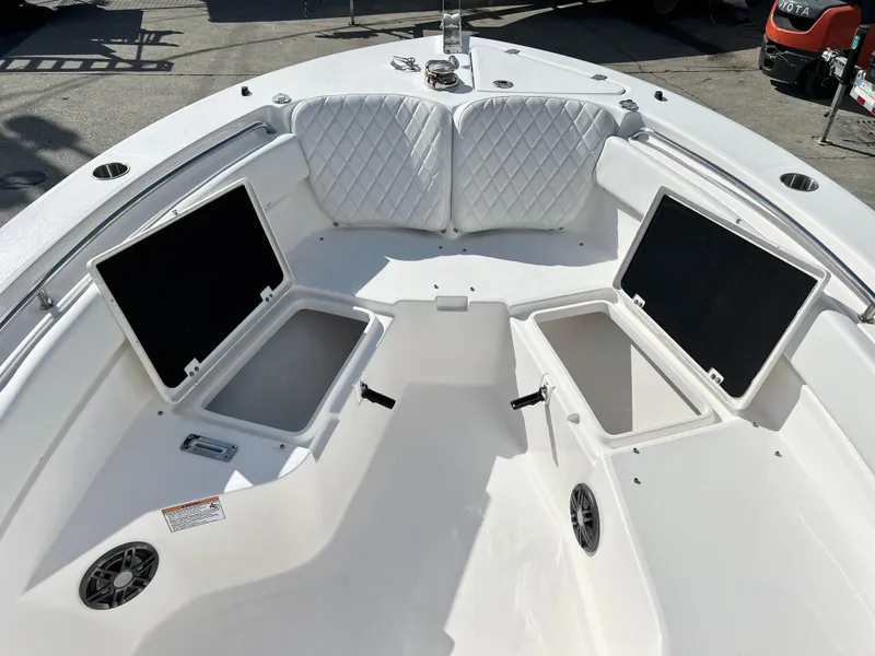 Slide: The Image of 2025 Sea Fox 248 Side Console boat interior with open storage compartments. - 19