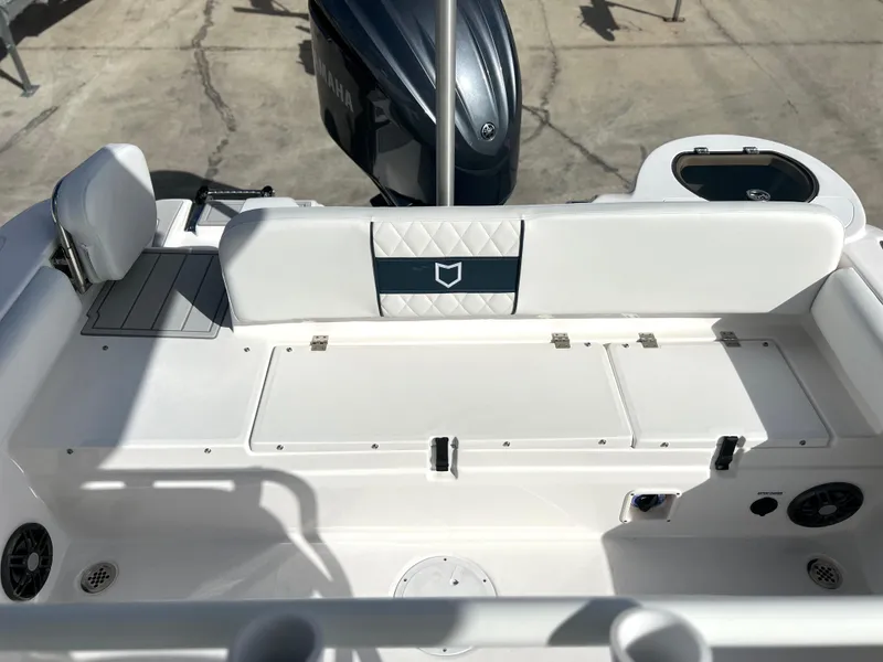 Slide: The Image of 2025 Sea Fox 248 Side Console boat interior with seating and storage. - 41