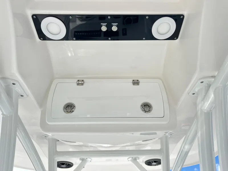 Slide: The Image of 2025 Sea Fox 248 Side Console boat interior with speakers and storage compartment. - 46
