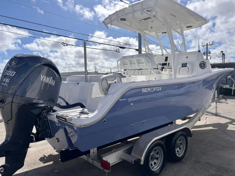 Slide: The Image of 2025 Sea Fox 248 Side Console boat with Yamaha engine on trailer. - 8