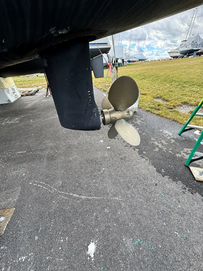 Slide: The Image of Propeller and rudder of a 2003 Catana 431 catamaran on dry land. - 11