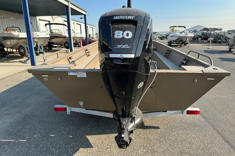 Slide: The Image of 2025 Smoker Craft Sportsman Pro 1866 boat with Mercury 80 engine at dealership. - 3