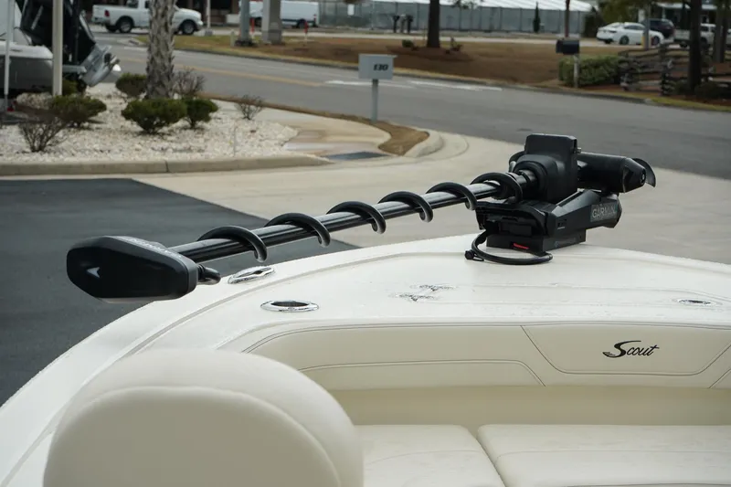 Slide: The Image of 2025 Scout 261 XSS boat with trolling motor on deck. - 34
