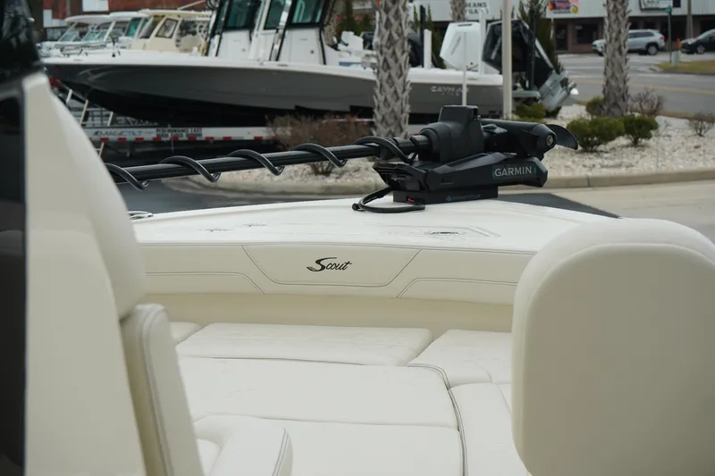 Slide: The Image of 2025 Scout 261 XSS boat interior with Garmin equipment, showcasing luxury seating and design. - 36