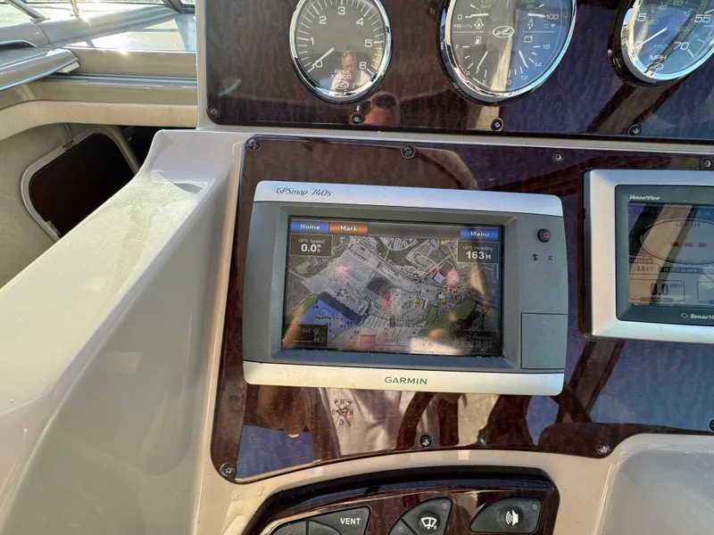 Slide: The Image of Dashboard of a 2008 Sea Ray 310 Sundancer with Garmin GPS and gauges. - 20