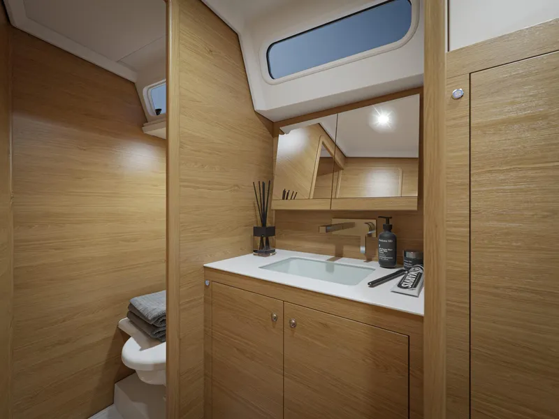 Slide: The Image of Luxurious 2026 X-Yachts X4 3 yacht bathroom with modern wood finish and sleek fixtures. - 12