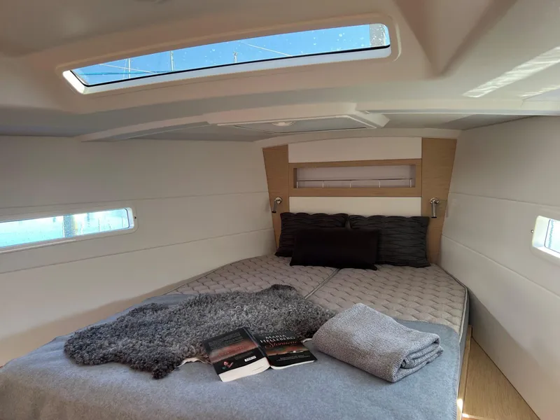 Slide: The Image of Luxurious cabin interior of 2026 X-Yachts X4 3 with cozy bedding and skylight. - 13