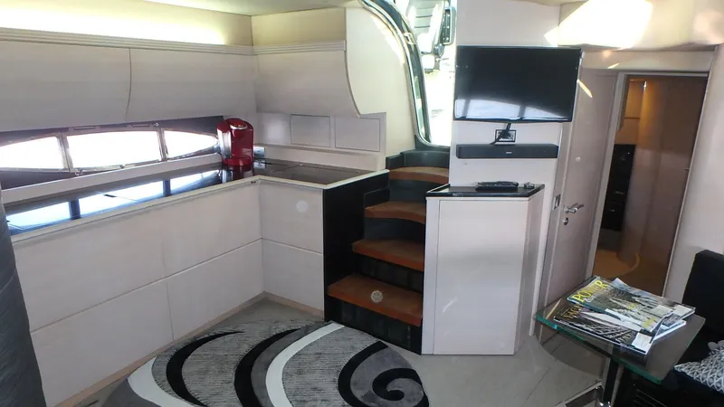 Slide: The Image of Interior of 2006 Azimut Atlantis 55 yacht with modern design and staircase. - 14