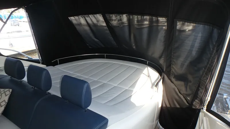 Slide: The Image of Interior view of 2006 Azimut Atlantis 55 yacht with cushioned seating. - 3