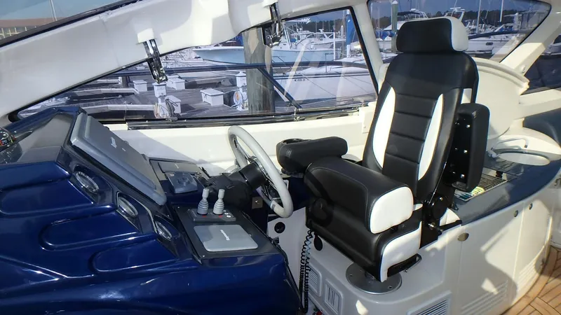 Slide: The Image of Helm of 2006 Azimut Atlantis 55 yacht with modern controls and seating. - 6
