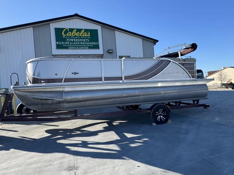 Slide: The Image of 2020 South Bay 521 CR pontoon boat at Cabela's service center. - 0