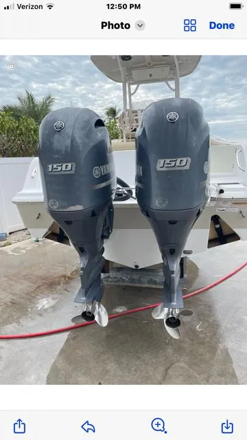 Slide: The Image of 2016 Sportsman HERITAGE 252 boat with twin Yamaha 150 outboard engines. - 5