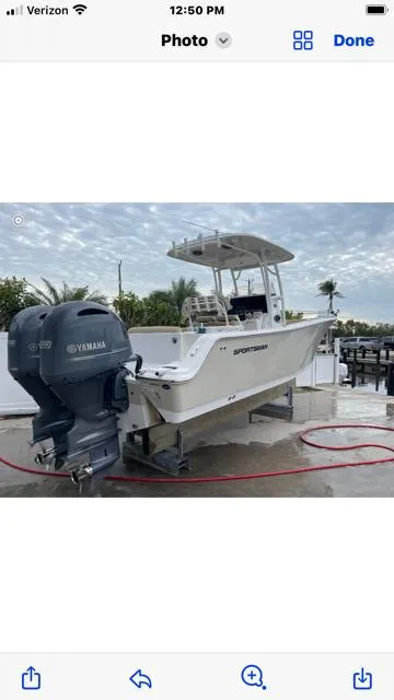 Slide: The Image of 2016 Sportsman HERITAGE 252 boat with Yamaha engine, docked outdoors. - 6