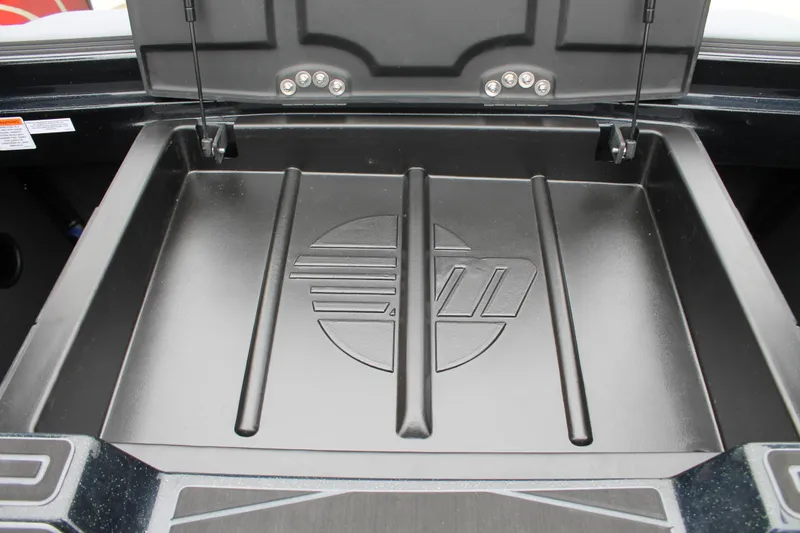 Slide: The Image of 2025 Malibu 23 MXZ storage compartment with logo, showcasing sleek design and functionality. - 12
