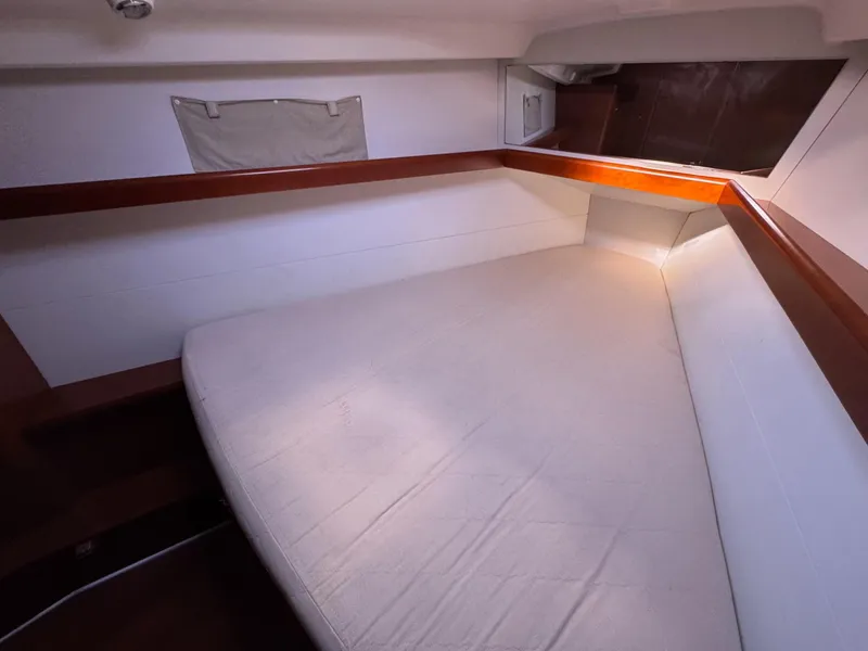Slide: The Image of Cozy cabin interior of 2012 Beneteau 40 sailboat with comfortable bedding. - 32