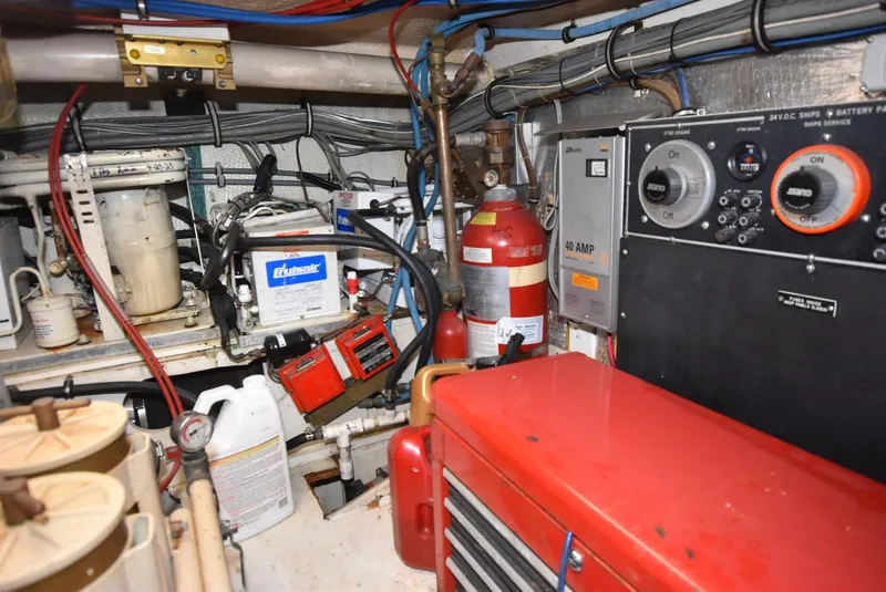 Slide: The Image of Engine room of 1996 Hatteras 50 Convertible with equipment and wiring. - 40