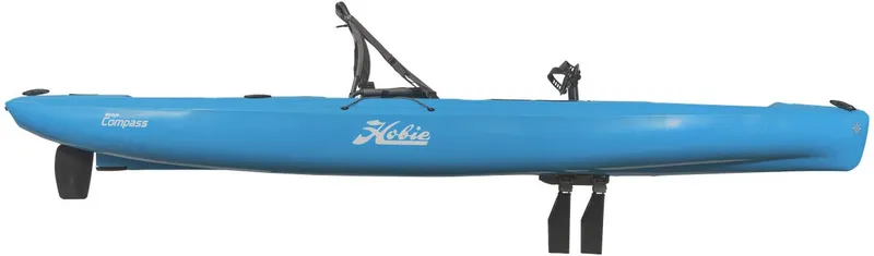 The Image of 2022 Hobie Compass kayak in blue, side view with pedal drive system. - 1