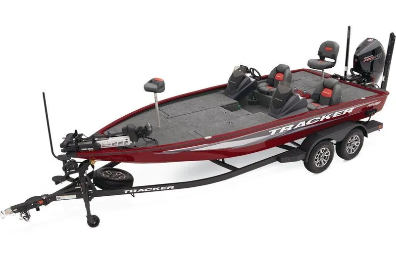 The Image of 2025 Tracker Savage 215 boat on trailer, red and gray design, equipped with seating and motor. - 1