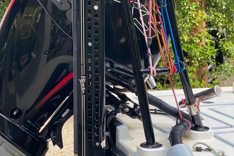 Slide: The Image of 2016 Maverick 18 HPX-V boat with motor and rigging details. - 4