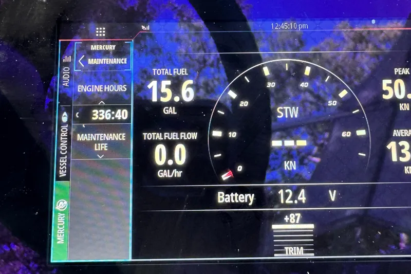 Slide: The Image of Dashboard of a 2016 Maverick 18 HPX-V showing fuel and engine data. - 7