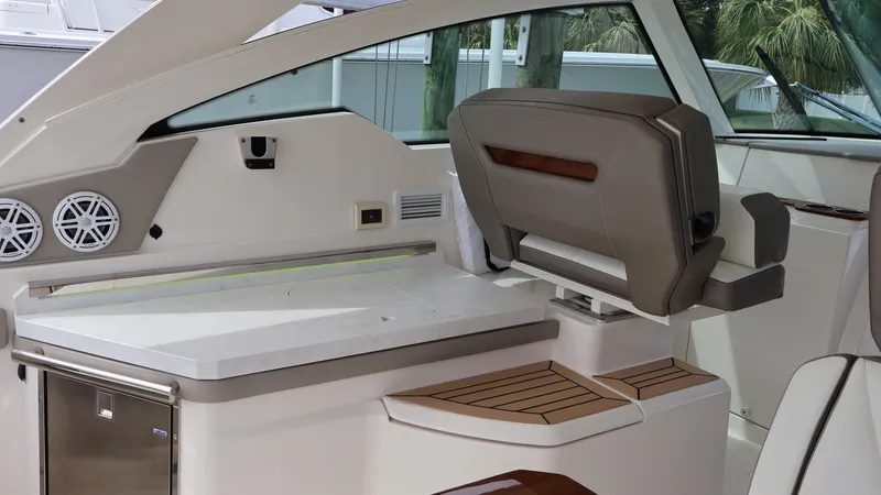 Slide: The Image of 2022 Tiara Yachts 34 LX interior with modern seating and sleek design. - 24