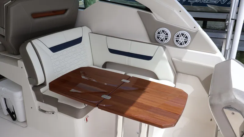 Slide: The Image of Interior seating and table of 2022 Tiara Yachts 34 LX, featuring elegant design. - 31