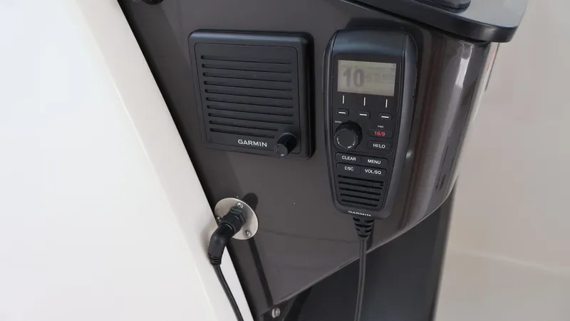 Slide: The Image of Tiara Yachts 34 LX 2022 model with Garmin marine radio and speaker system. - 39
