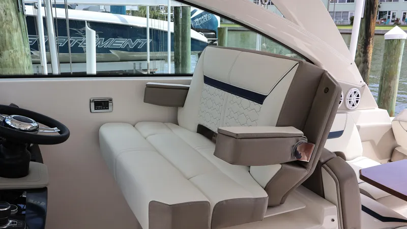 Slide: The Image of 2022 Tiara Yachts 34 LX interior with luxurious seating and modern design. - 41