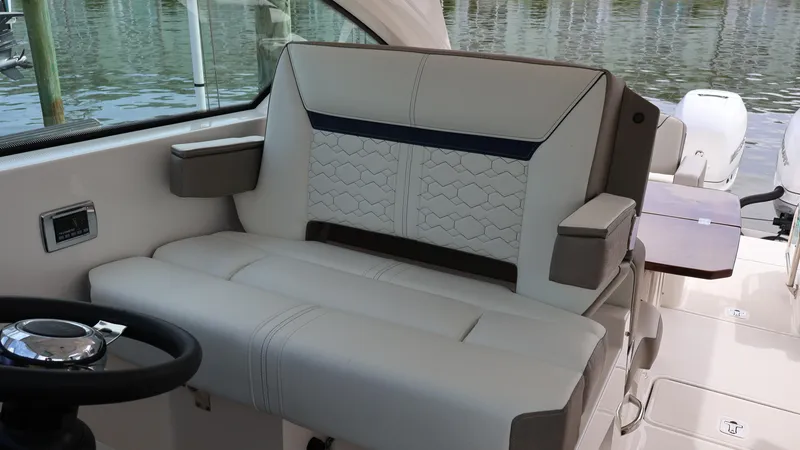 Slide: The Image of 2022 Tiara Yachts 34 LX interior seating with elegant design and comfortable upholstery. - 42