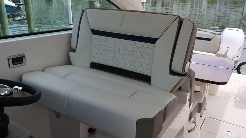 Slide: The Image of Luxury seating on 2022 Tiara Yachts 34 LX, featuring elegant design and comfort. - 43