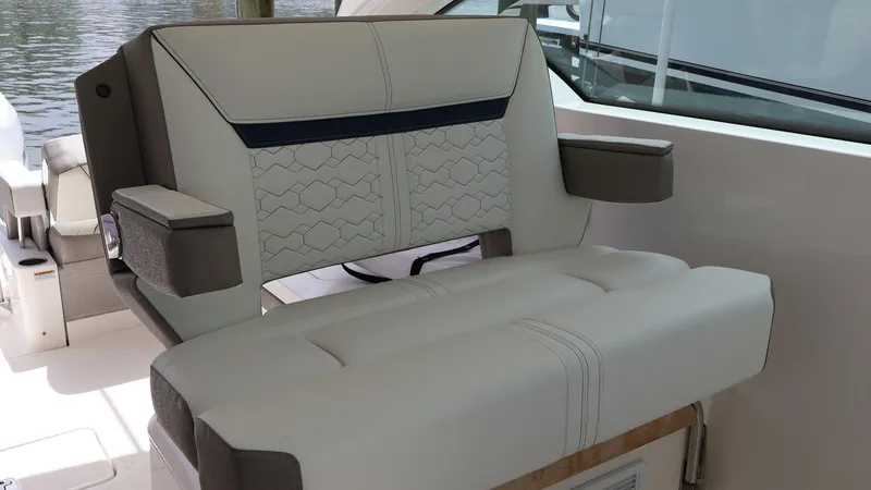 Slide: The Image of Luxury seating on 2022 Tiara Yachts 34 LX, featuring elegant design and premium materials. - 44