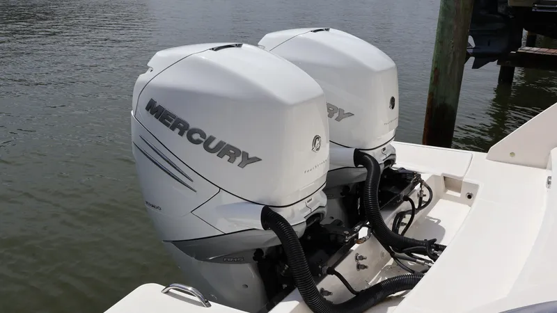 Slide: The Image of Twin Mercury outboard engines on a 2022 Tiara Yachts 34 LX boat. - 9