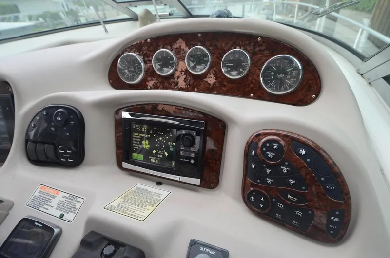 Slide: The Image of Dashboard of 2007 Sea Ray 340 Sundancer with gauges and controls. - 19