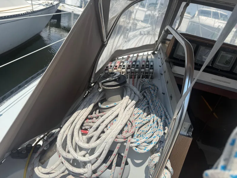 Slide: The Image of Cockpit of 1986 Abbott 36 sailboat with ropes and winch. - 16