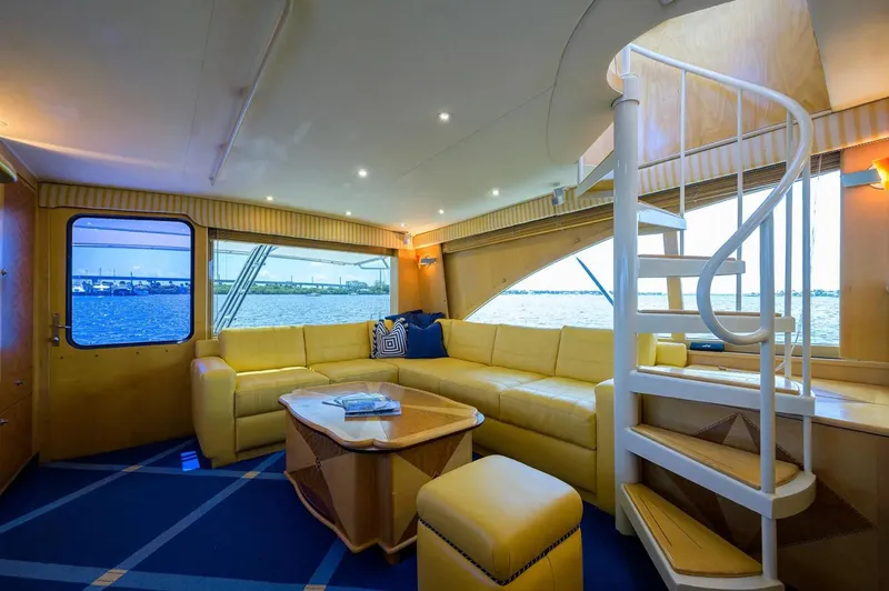 Slide: The Image of Luxurious interior of 2003 Ocean Yachts 62 Enclosed Bridge Super Sport with spiral staircase. - 10