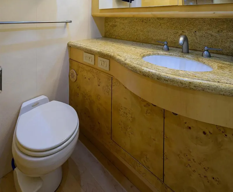 Slide: The Image of Bathroom interior of 2003 Ocean Yachts 62 Enclosed Bridge Super Sport with granite countertop. - 25