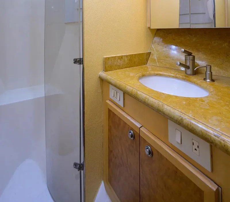 Slide: The Image of Bathroom interior of 2003 Ocean Yachts 62 Enclosed Bridge Super Sport with shower and sink. - 30