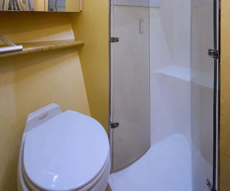 Slide: The Image of Bathroom interior of 2003 Ocean Yachts 62 Enclosed Bridge Super Sport. - 31