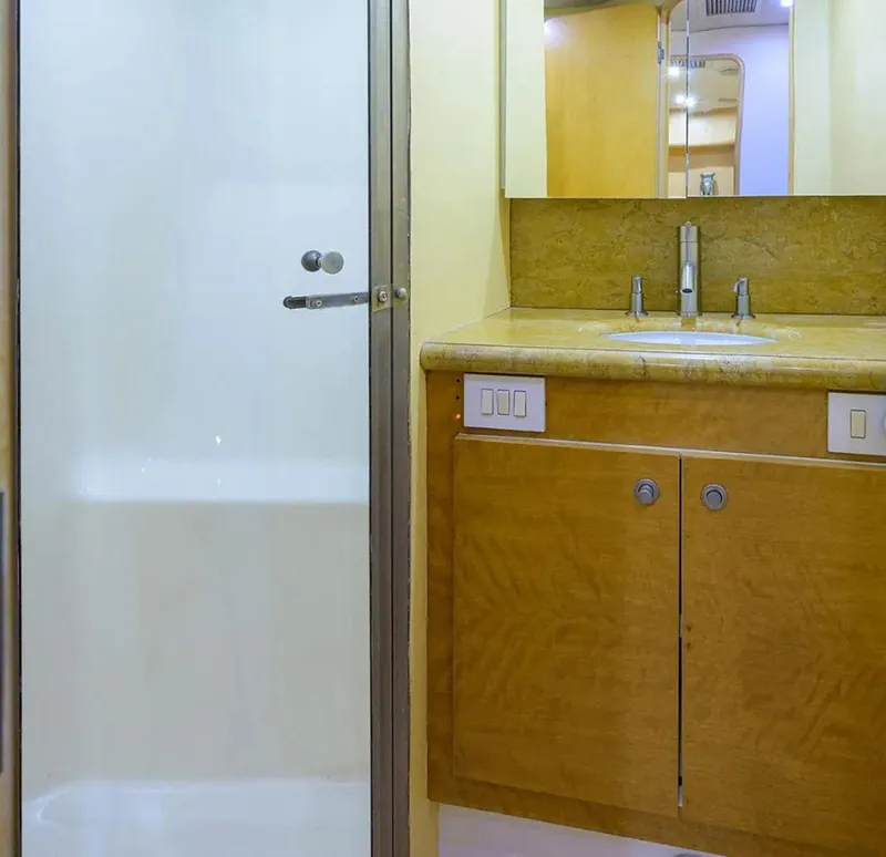 Slide: The Image of Bathroom interior of 2003 Ocean Yachts 62 Enclosed Bridge Super Sport. - 34
