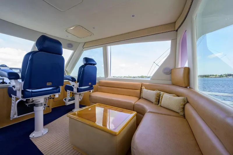 Slide: The Image of Luxurious interior of 2003 Ocean Yachts 62 Enclosed Bridge Super Sport with plush seating. - 41