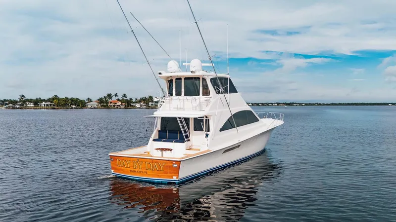 Slide: The Image of 2003 Ocean Yachts 62 Enclosed Bridge Super Sport on calm water. - 7