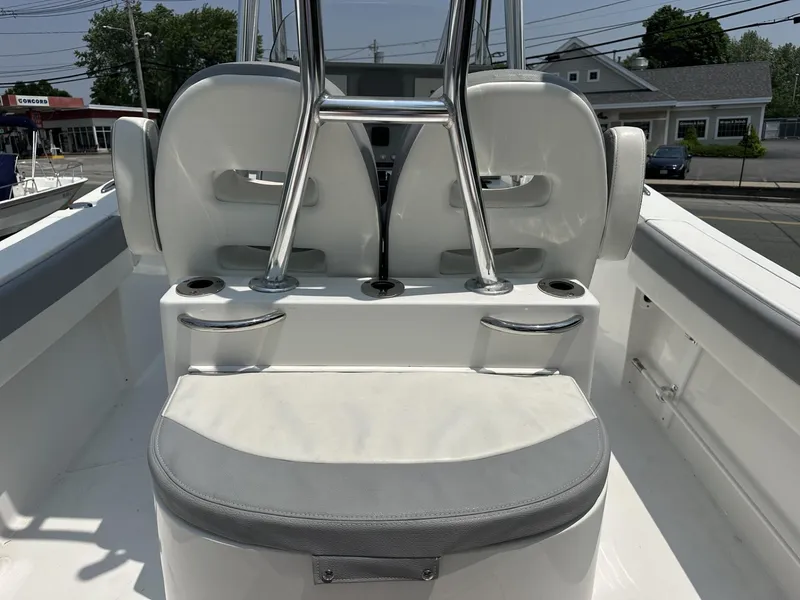 Slide: The Image of 2020 Release 240 R boat interior with dual seats and cup holders. - 10