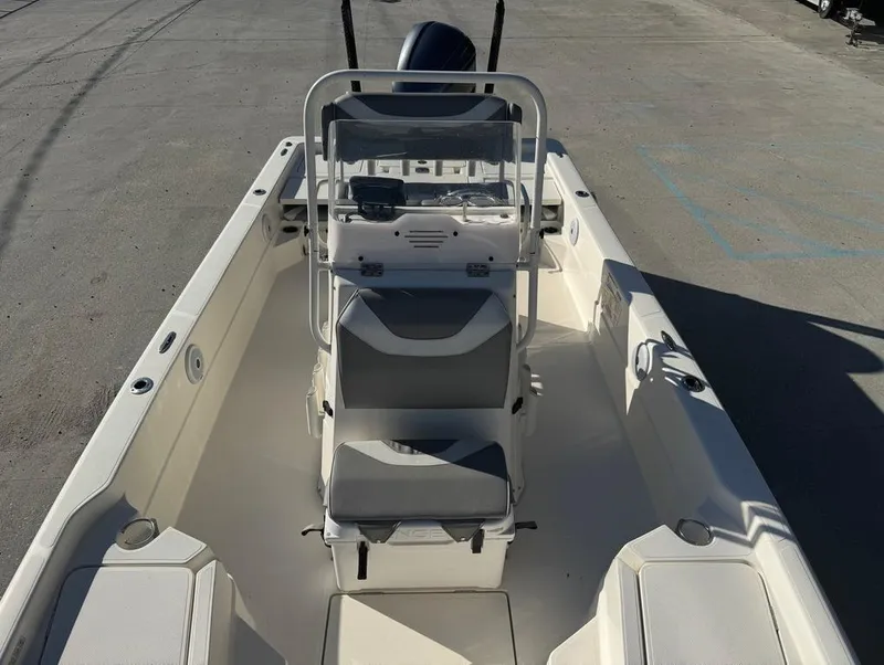 Slide: The Image of 2019 Skeeter SX 240 boat interior with console and seating, viewed from above. - 10