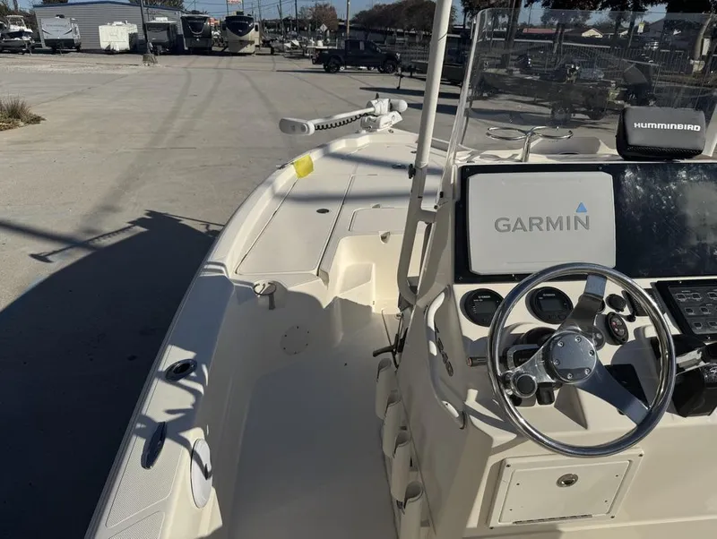 Slide: The Image of 2019 Skeeter SX 240 boat dashboard with Garmin and Humminbird electronics. - 17